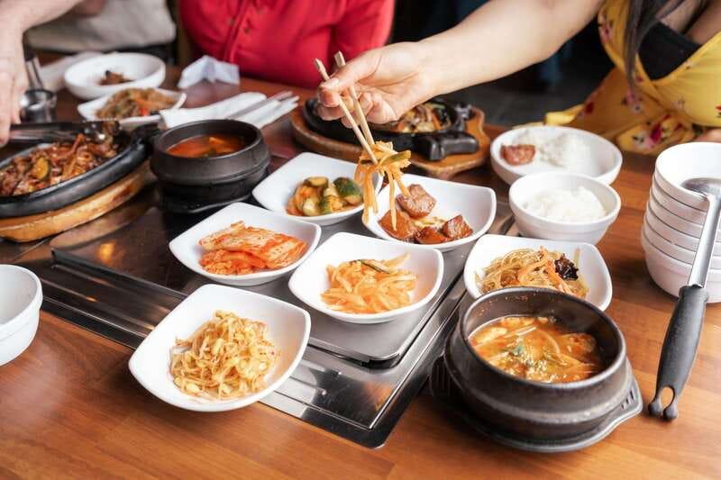 Downtown Vancouver: Asian Eats Walking Food Tour - Getting Oriented: Meeting Outside Kirin and Riding to Richmond