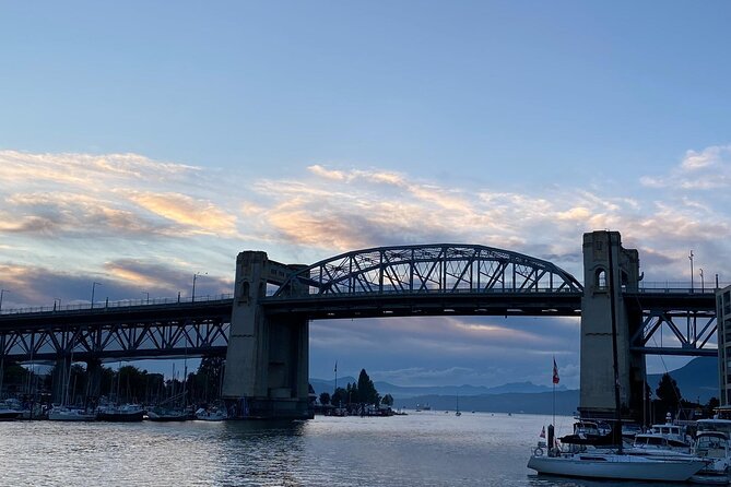 Private Guided Grand City Tour in Vancouver with your luggage - Stanley Park sea wall to Lions Gate, with lighthouse and wetsuit stops