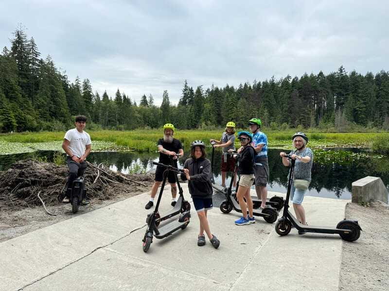 Stanley Park EUC & E-scooters loop tour - Lost Lagoon: forest trails, towering trees, and a good chance for wildlife