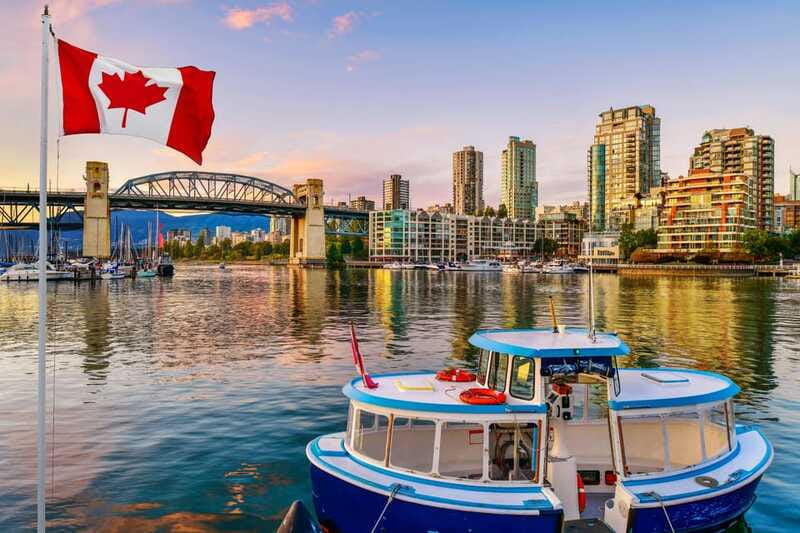 Vancouver: City Highlights Bus Tour - Granville Island Public Market: indoor food, stalls, and quick tastings