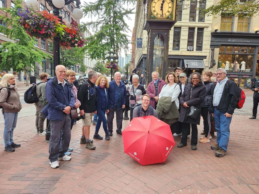 Vancouver: Private Walking Tour of City Highlights | 3-Hour - Starting at Canada Place, with a red umbrella and ocean air